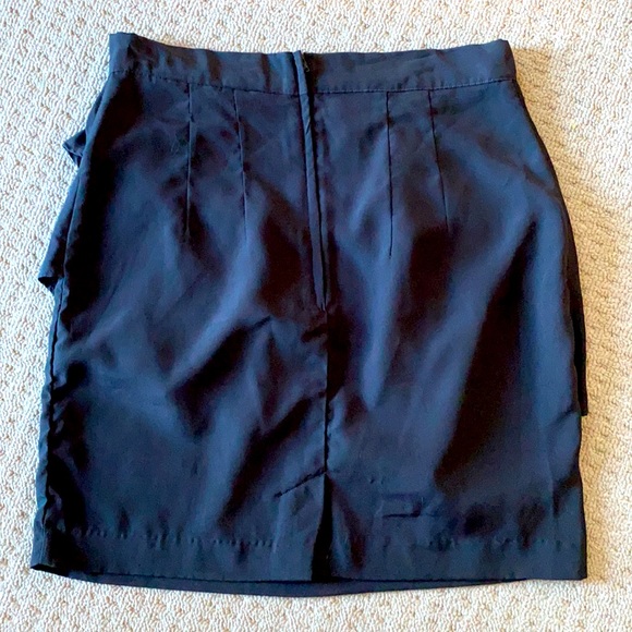 Black, mini skirt. - Picture 2 of 2